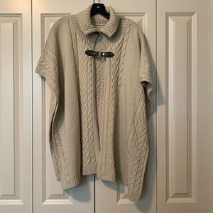 Cool sweater cape, beige, one size fits all.